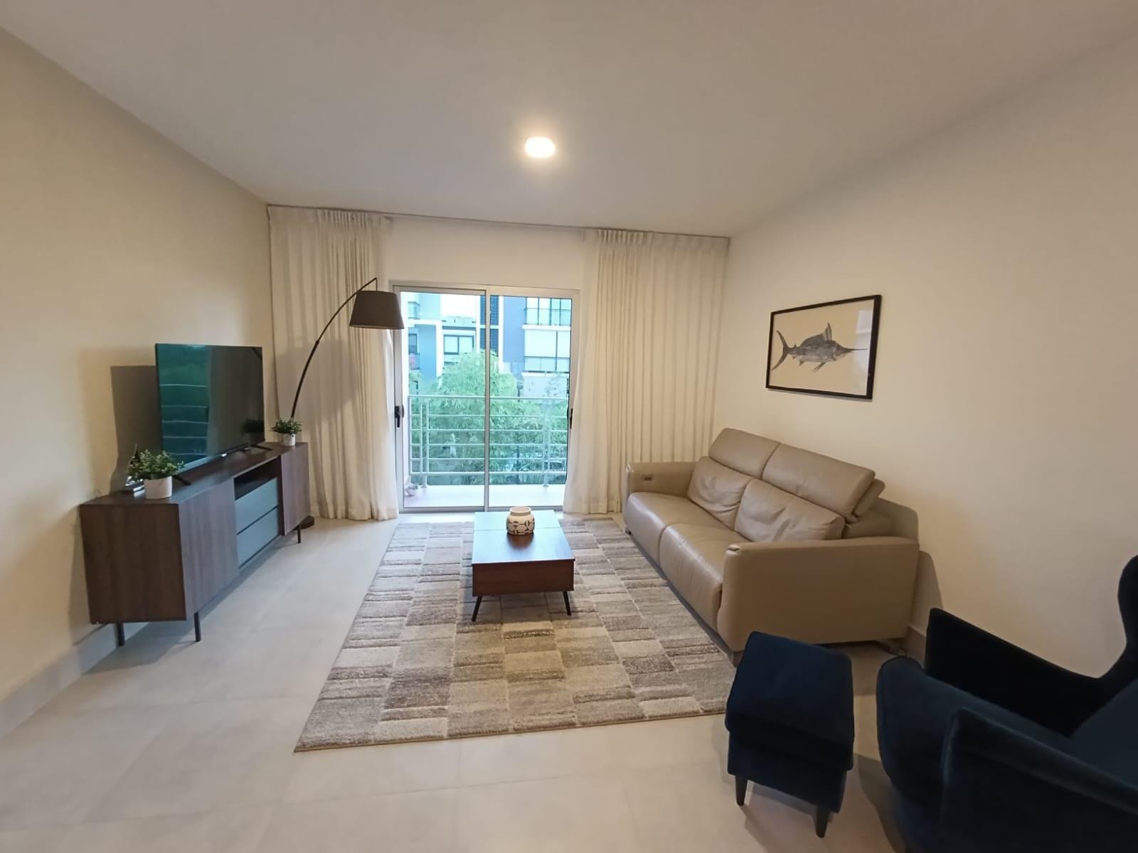 Harmony Lounge 2-bedroom apartment living room with balcony