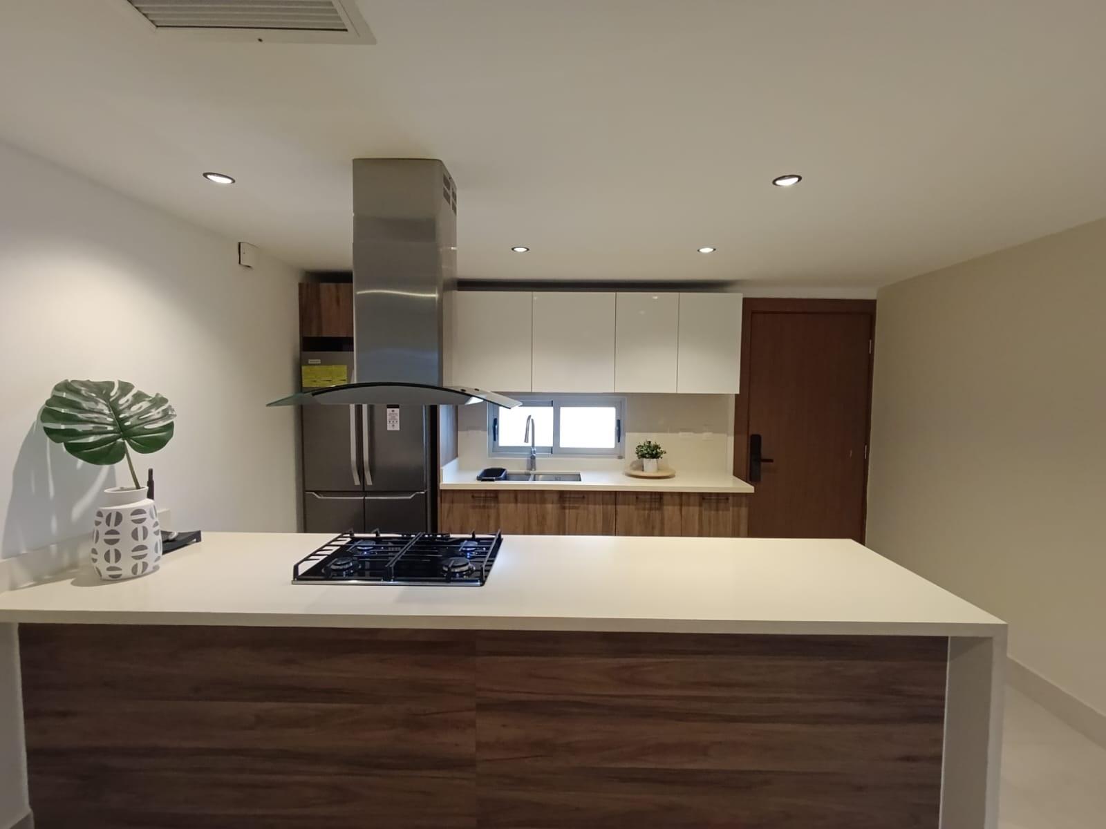 Harmony Lounge 2-bedroom apartment kitchen with island