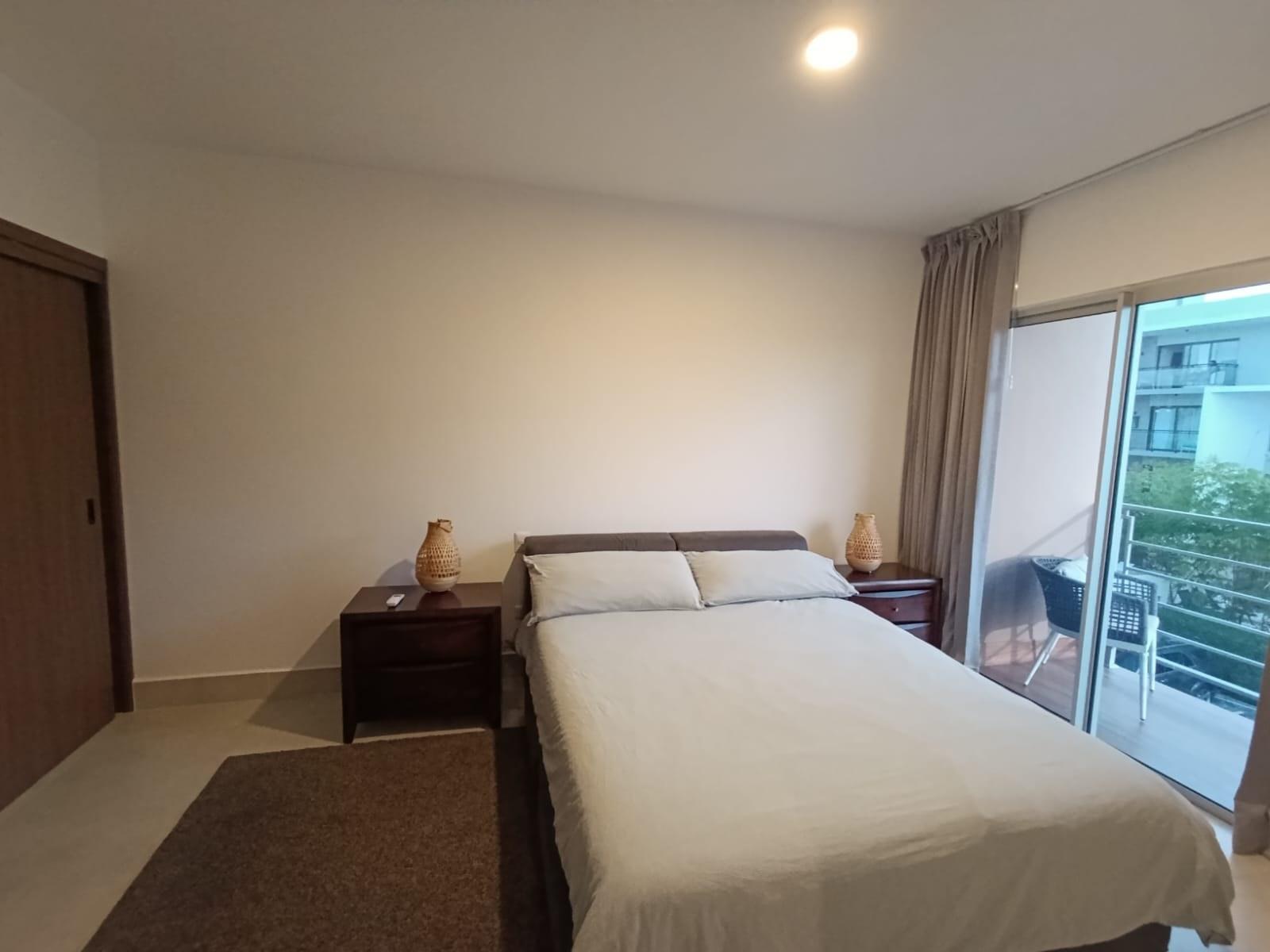 Harmony Lounge 2-bedroom apartment master bedroom with balcony